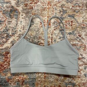 Lululemon size 8 sports bra in light blue/gray color.